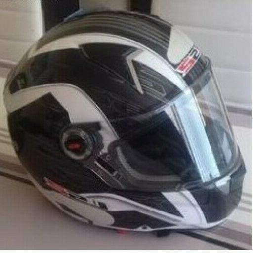 casque de moto noir et blanc taille